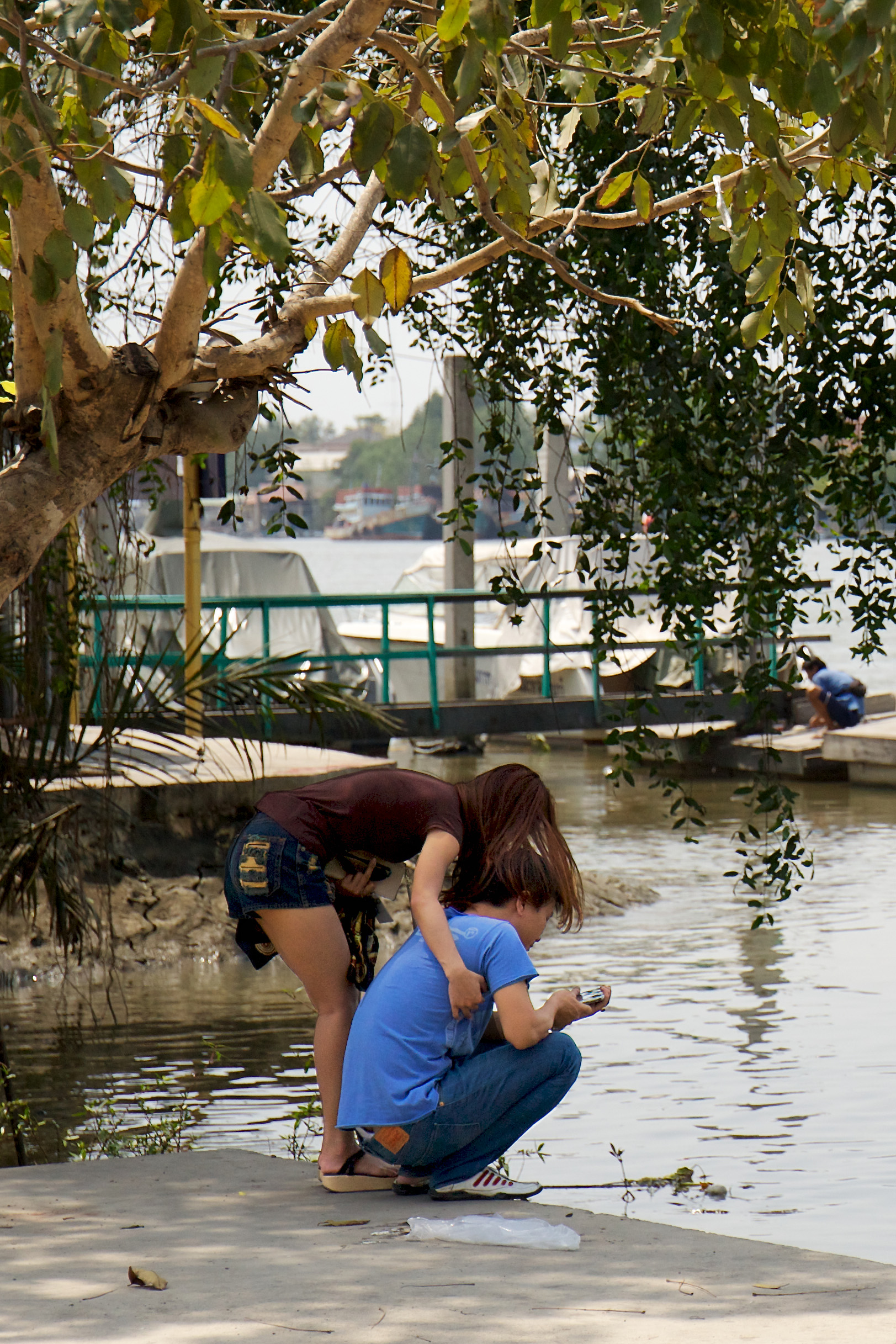 Couple by water's edge